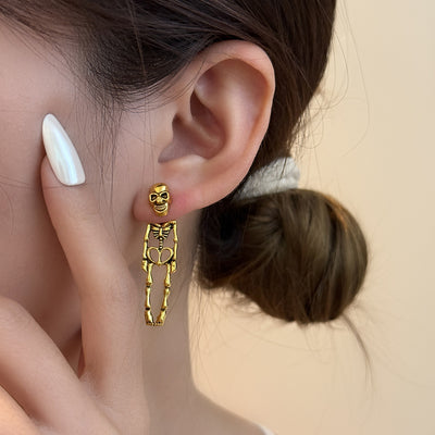 Primary supplied view of jointed skeleton stud earrings
