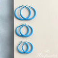 Matte Blue Thick Tube Metal Hoop Earrings Latch Closure view 1