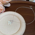 Pastel Flower and Butterfly Pendant Necklaces in Three Colors view 6