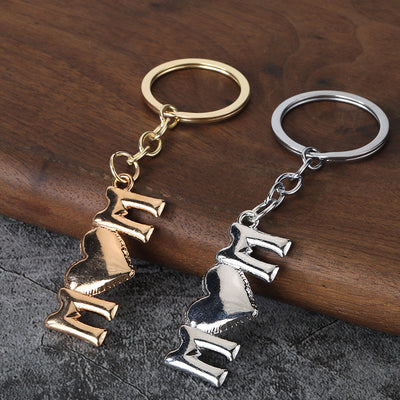 Gold-tone and silver-tone MOM silhouette keychains