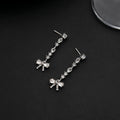 Clear Bow Silver Tone Long Line Dangle Stud Earrings view 3