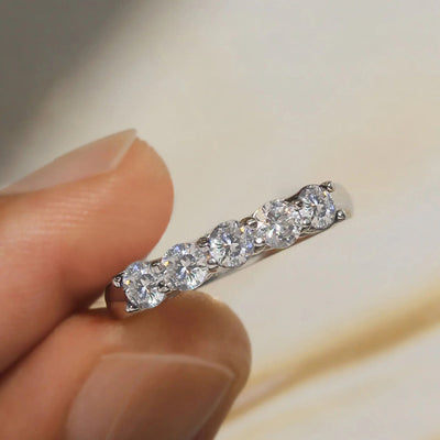 Product view showing silver-tone alternating round-stone slim band ring
