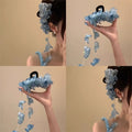 Red Or Blue Fabric Flower Hair Claw With Long Petal Chain Tassels view 1
