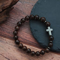 Dark Wood Bead Cross Stretch Bracelet with Silver Tone Spacers view 3