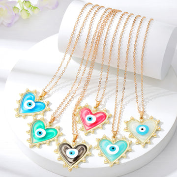 Gold Tone Pearl Edge Heart Resin Evil Eye Pendant Necklaces
