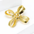 Gold Bow Brooch In 1 Style With Polished Metal And Decorative Details view 2
