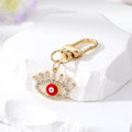 Gold Tone Crystal Lash Enamel Evil Eye Clip Keychains in Five Colors view 4