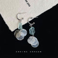 Silver Tone Huggie Hoop Blue Stone And Translucent Disc Earrings view 4