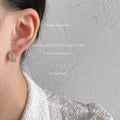 Gold Capsule Cat Eye Stud Earrings Cream White Stones view 2