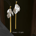 Gold Tone White Pearlescent Petal Long Chain Tassel Earrings view 1