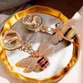 Jeweled Bee Keychains in Four Distinct Yellow Black Opal and Winged Designs view 1