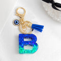 Ombre Glitter Resin Letter Keychain With Evil Eye Charm view 3