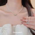 Bow Pearl Pendant Necklace in Polished Mixed Media Design view 1