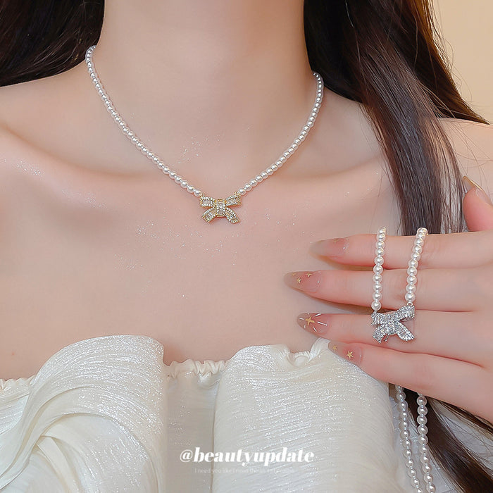 Bow Pearl Pendant Necklace in Polished Mixed Media Design