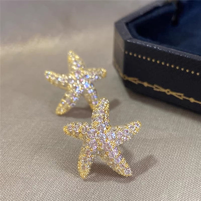 Clear Stone Pave Starfish Stud Earrings In Polished Gold Tone