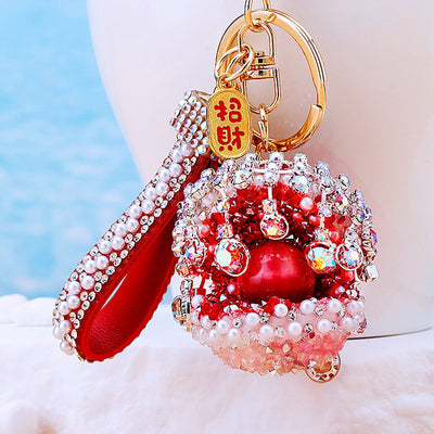 Main image 1 shows a supplied presentation of short pearl curtain shell keychains with visible attached key hardware.