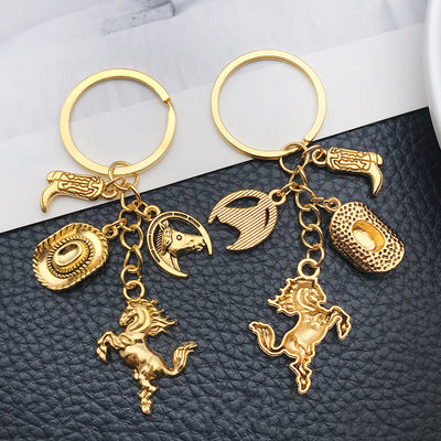 Front product photo of antique gold and silver western horse hat and boot charm keychains showing the pictured design ar