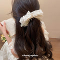 Fabric Floral Ruffle And Cream Bow Twist Hair Claws view 3