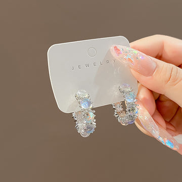 Silver Tone Opalescent Oval Cluster Compact Huggie Earrings