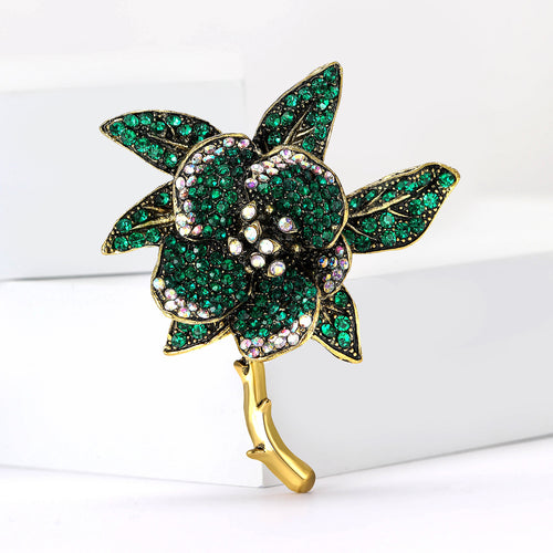 Angled display showing the brooch color and crystal details