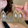 Layered Teardrop Wire Earrings with White Pearl Look Drops view 1