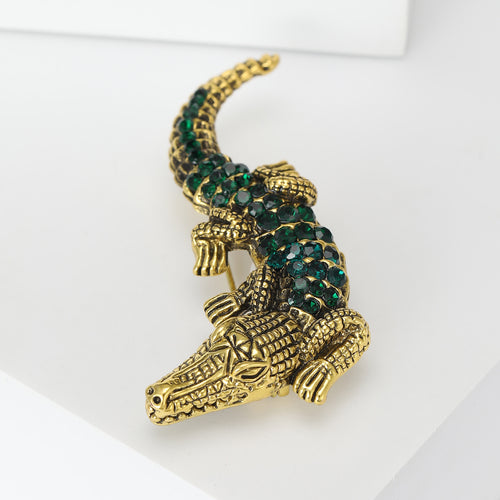 Crocodile Brooch displayed in a styled product view