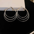 Multi Hoop and Twisted Hoop Earrings in Eight Metallic Styles view 6