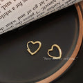 Gold Heart Huggie Hoop Earrings Polished Open Outline view 2
