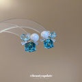 Blue Crystal Pearl Geometric Stud Earrings with Reflective Details view 2