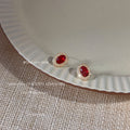 Gold Tone Clear Halo Red Oval Faceted Stone Stud Earrings view 3