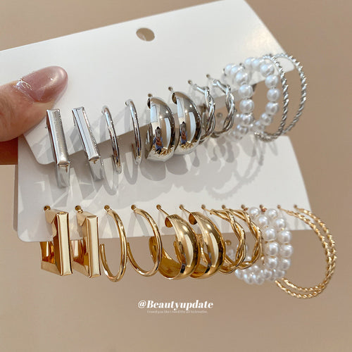 Gold and silver six pair geometric hoop earring cards held together