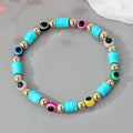 Gold Tone Evil Eye and Polymer Clay Bead Stretch Bracelets view 3