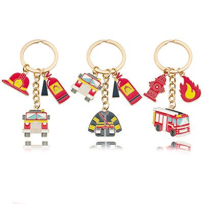 Front view of all three red firefighting charm keychains on a white background.