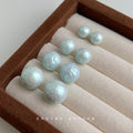 Aqua Pearl Like Round Stud Earrings In Four Graduated Sizes view 4