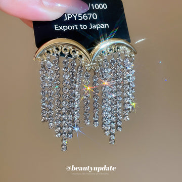 Gold Tone Crescent Earrings with Cascading Crystal Fringe