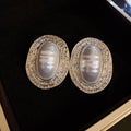 Ribbed Oval Frame Pearl Statement Stud Earrings in Gold and Silver view 7