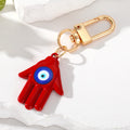 Gold Tone Colorful Hamsa Evil Eye Clip Keychains in Nine Colors view 2