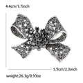 Dark Crystal Bow Brooch With Textured Ribbon Loops view 6