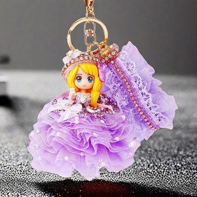 Main image 1 shows a supplied presentation of jeweled ballgown princess doll keychains with visible attached key hardwar