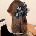 Black Layered Organza Bow Hair Claw With Crystal Triangle Details view 3
