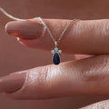 Blue Teardrop Stone Pendant Necklace Gold Tone Cable Chain view 1