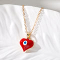Gold Tone Heart Resin Evil Eye Pendant Necklaces in Seven Colors view 8