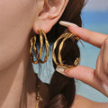 Twisted Double Hoop Earrings in Gold Silver and Two Tone view 3