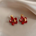 Red Flower and Gold Tone Huggie Drop Earrings with Detailed Finish view 3