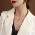 Twisted Cross Circle Ring Pendant Necklace In Gold Or Steel view 4