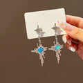 Silver Starburst and Iridescent Blue Round Earrings view 1