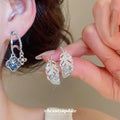 Silver Tone Feather and Blue Flower Stud Earrings Jewelry Pair view 2