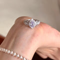 Oval Halo Filigree Cocktail Ring Lavender Or Red Center view 1