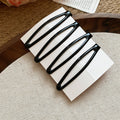 Glossy Enamel Openwork Oval Snap Hair Clips 4-Pack Black view 6