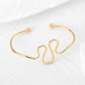 Gold and Silver Tone Open Wire Cuff Bracelets in Twelve Designs view 11